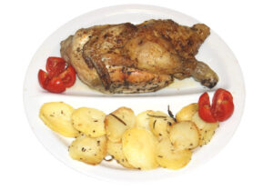 Mezzo pollo al forno con patate arrosto