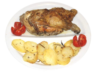 Mezzo pollo al forno con patate arrosto